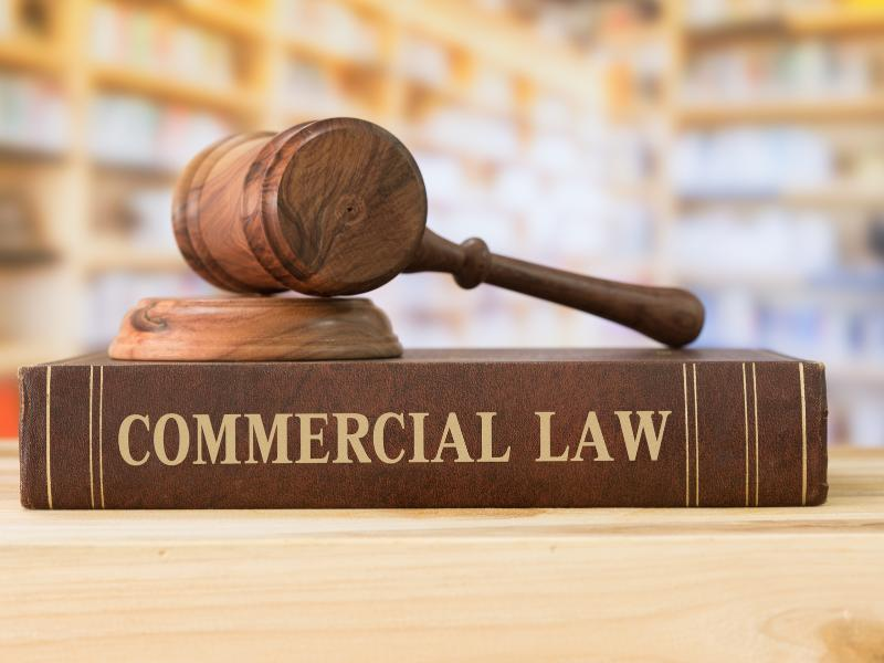 How does commercial law address the taxation of transactions?